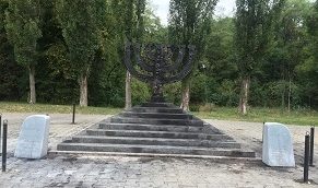 Menorah monument set on fire at Babi Yar memorial park in Kyiv