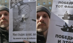 Росіянина, який вийшов з антивоєнними плакатами на акцію “Безсмертний полк”, звинуватили в “дискредитації російських військових”
