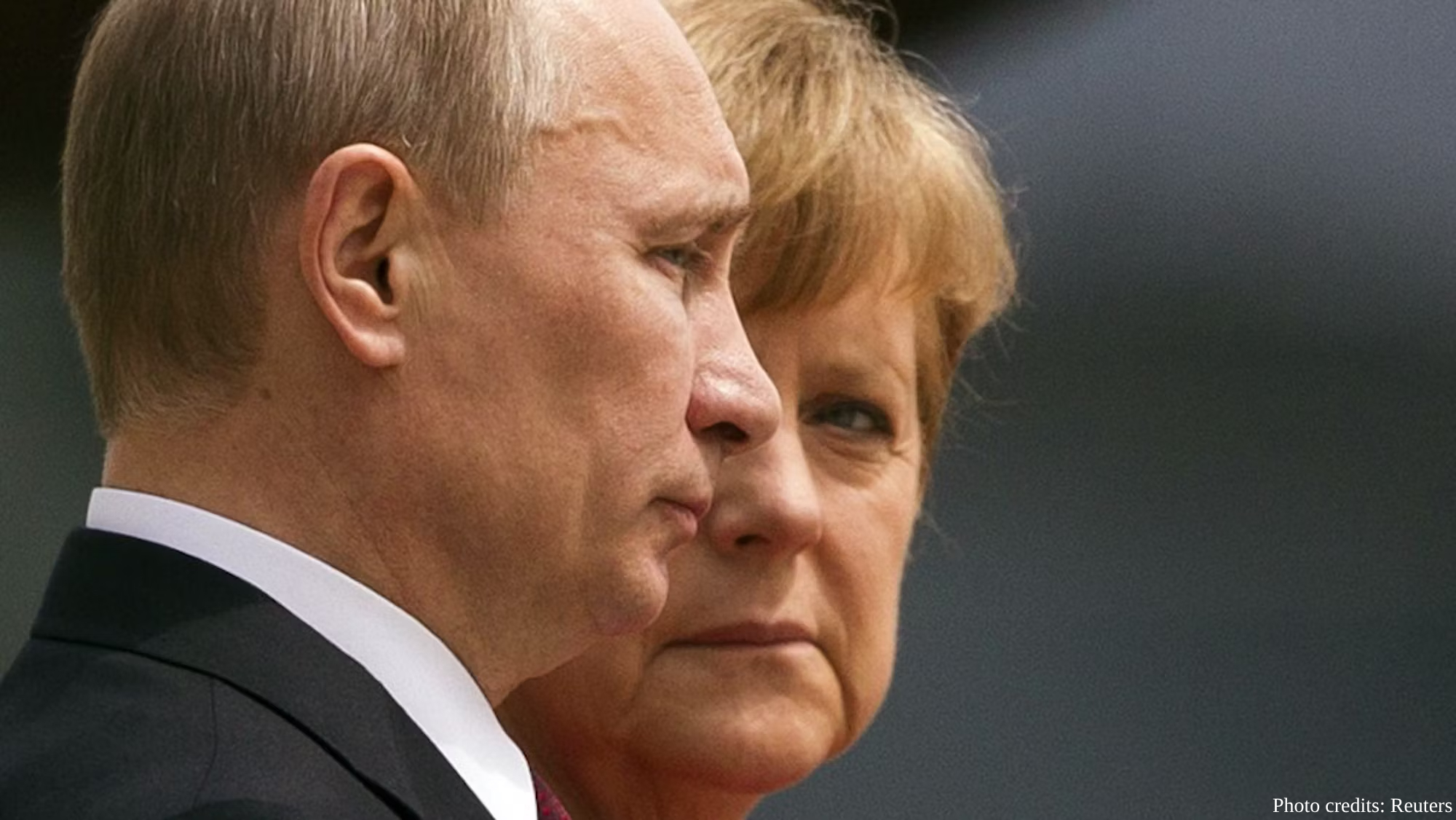 Two political leaders stand in profile during what appears to be a formal diplomatic meeting, with a man in a dark suit and white shirt in the foreground and a woman with short blonde hair slightly behind him. The close-up composition captures a serious, formal moment between the officials, credited to Reuters.