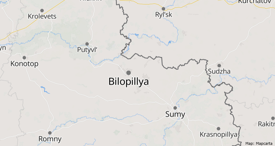 A simple grayscale map shows the Sumy Oblast region of Ukraine with its administrative boundaries marked by dark lines, neighboring cities labeled including Krolevets, Ryl'sk, Putyvl', Konotop, Bilopillya, Romny, Sudzha, Sumy, Krasnopillya, and Rakitn, with rivers shown as light blue lines and Mapcarta credit noted.